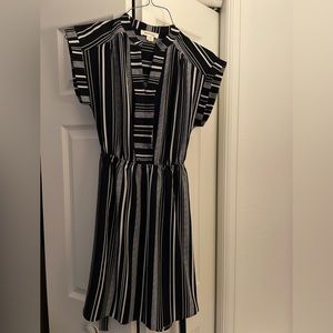 Navy and white stopped dress with belt. Worn once.
